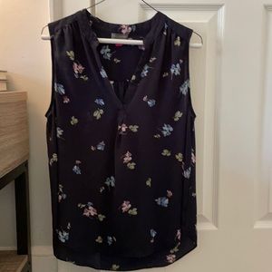Sleeveless floral top.